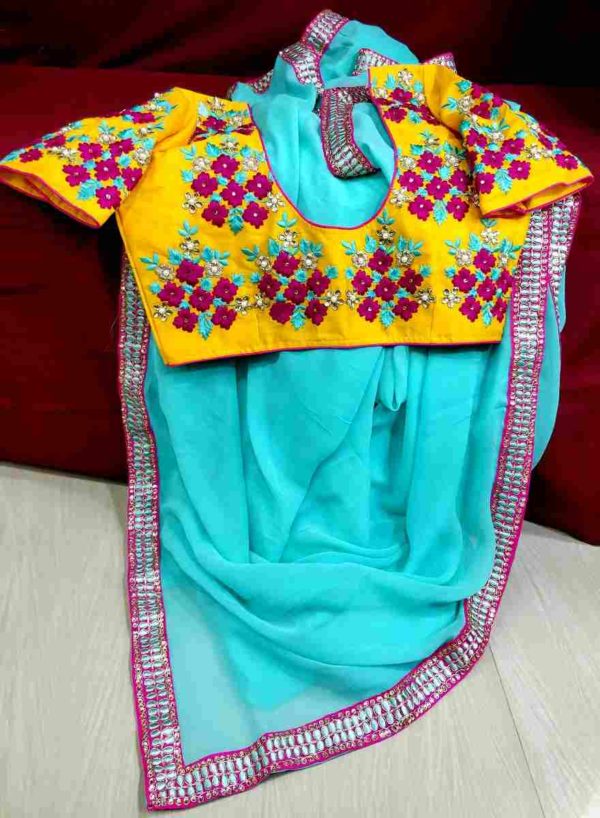 Ice Blue Georgette Saree With Silk Mustard Blouse